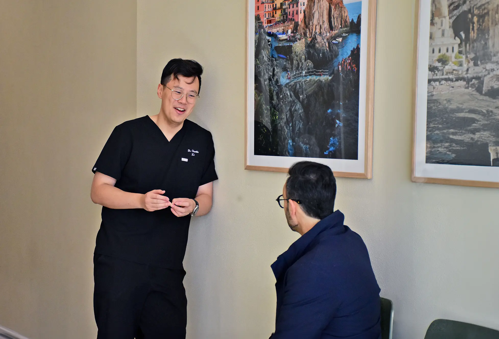 Caring dentist at Top Dentists Footscray assisting a patient before a checkup.
